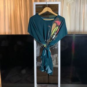 Lightly worn top with beautiful butterfly, fancy open butterfly style sleeve.